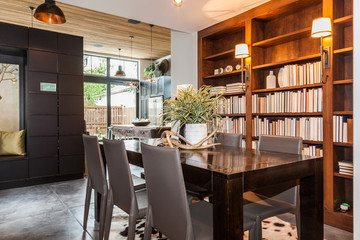 modern dining room with library