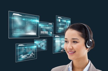 Business woman wearing Head set against technological background