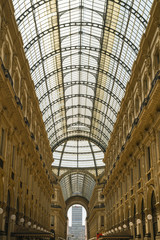 Obraz premium MILAN, ITALY - 13-05-2017: Galleria Vittorio Emanuele II in Milan. It's one of the world's oldest shopping malls, designed and built by Giuseppe Mengoni between 1865 and 1877.