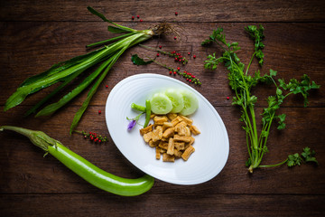 Fried dry buffalo skin on wooden table, Thai food, Laos food.
