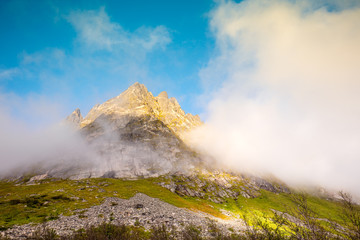 The top of the mountain in the clouds