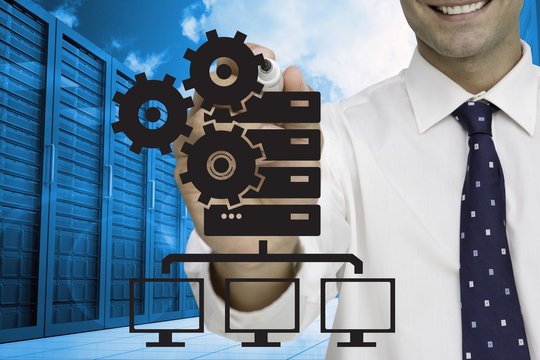 Businessman drawing against server room background