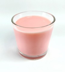 Strawberry milk in glass isolated on white