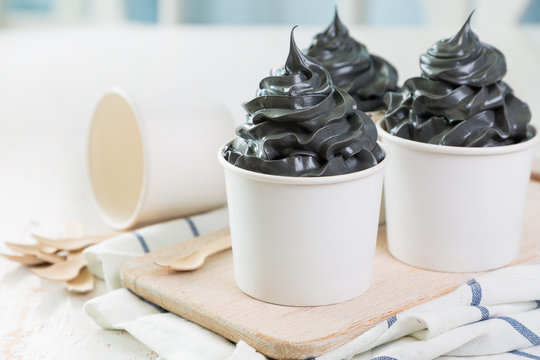 Black Ice Cream In White Cups