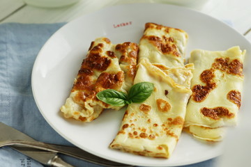 Tasty and healthy breakfast omelette from eggs on a white background.close up