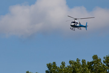 National Grid helicopter flying over willington old power station, surveying the site from overhead.