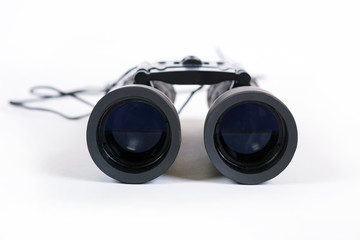 Black binoculars isolated on white background.