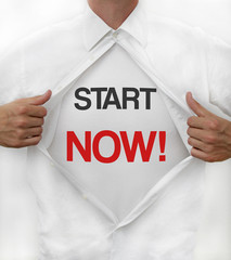 Man opens shirt to reveal "Start NOW!"