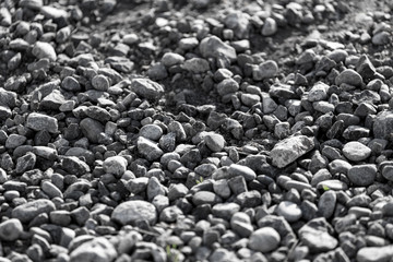 Crushed stone on the road as a background