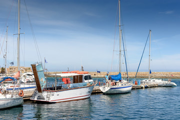 Fototapeta premium The port is beautiful white yachts and boats