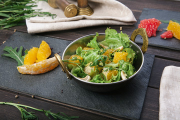 Vegetarian indian restaurant dish, fresh salad on wood