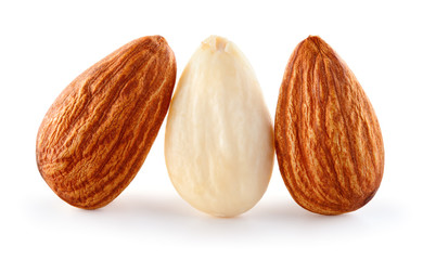 Closeup of almonds. Three nuts isolated on white background. Full depth of field.