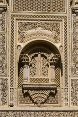 Indian ornament on wall of palace in Jaisalmer fort, India.