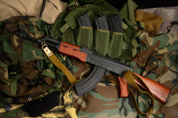 Terrorist Weapons with tactical chest rigs and backpack.