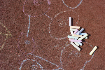 chalks in a variety of colors arranged on a white background