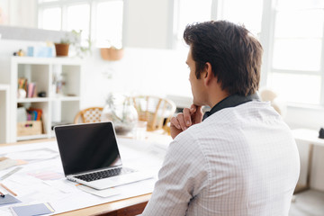 Young businessman in office