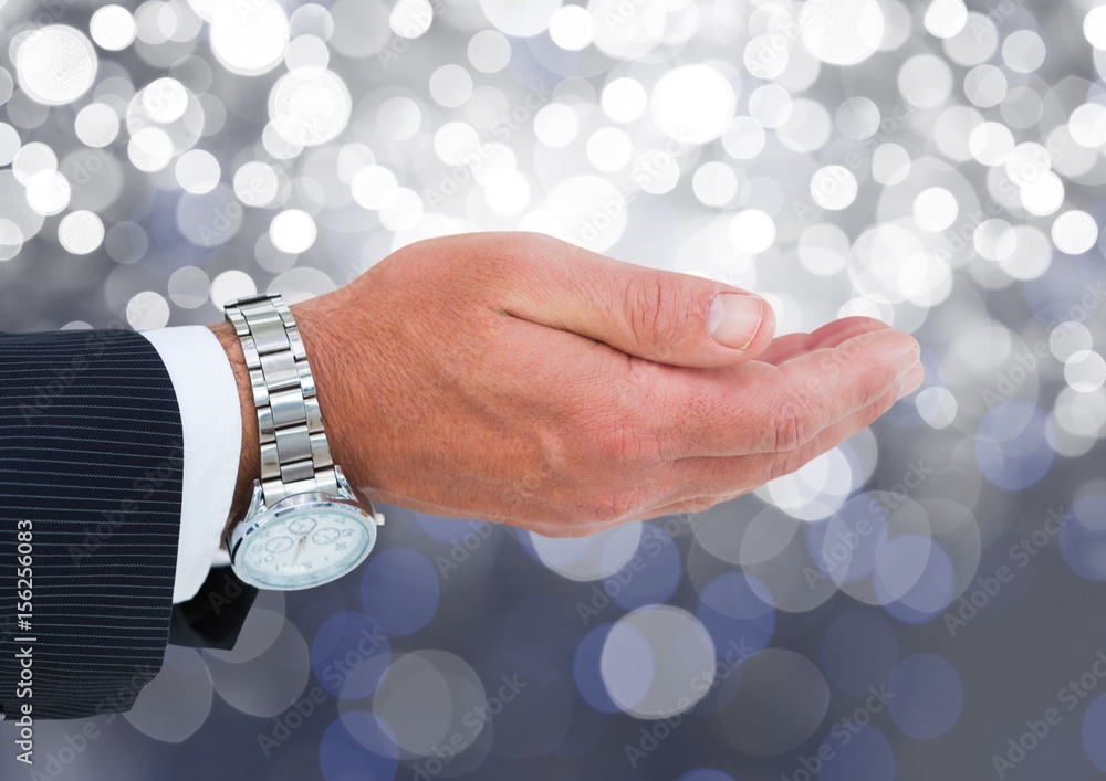 Poster hand open with rich watch with sparkling light bokeh background