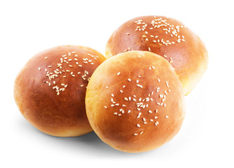 Burger bun with sesame seeds isolated on white background with clipping path