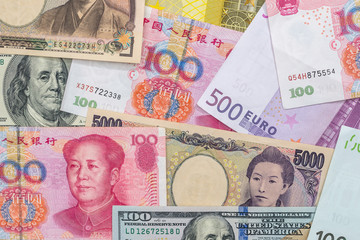 banknotes of the most dominant countries in world - dollar, euro, yuan, yen