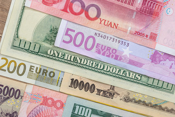 banknotes of the most dominant countries in world - dollar, euro, yuan, yen