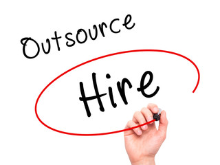 Man Hand writing and Choosing to Hire instead of Outsource with black marker on visual screen