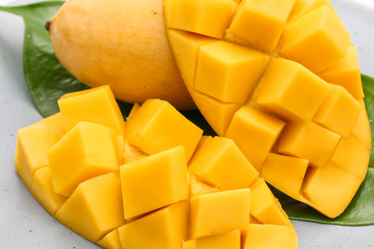 Closeup macro shot of carve beautiful yellow mango with sticky rice
