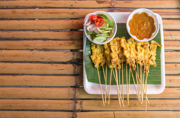 Pork barbecue yellow curry sauce grill with curry and sweet sauce mix with cucumber and vinegar....