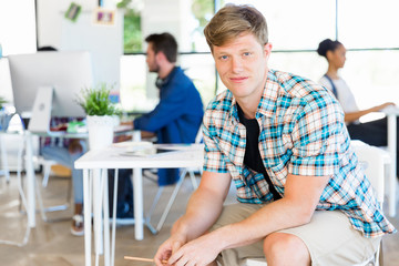 Young man working in office