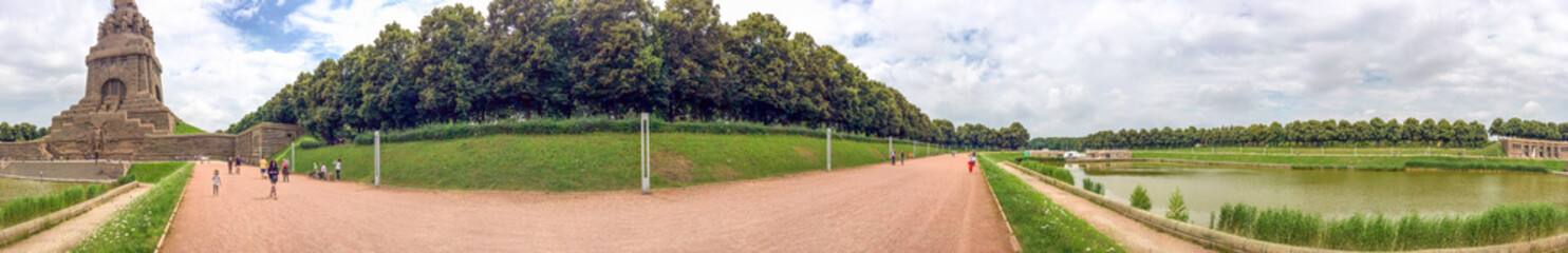 Fototapeta premium LEIPZIG, GERMANY - JULY 2016: Tourists visit Battle of Nations Monument. Leipzig attracts 3 million people annually