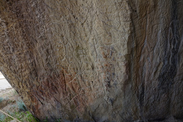 Fototapeta na wymiar Petroglyphs made by primeval man. Gobustan national park. Azerbaijan