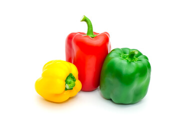 Obraz na płótnie Canvas Green, yellow and red fresh bell pepper or capsicum isolated on white background.