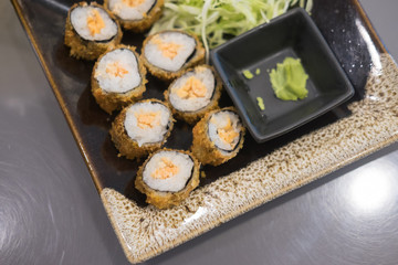 Close up view of sushi roll with salmon