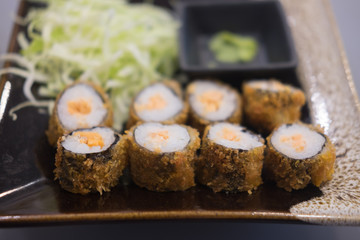 Close up view of sushi roll with salmon