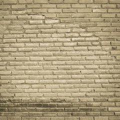 Old brick wall has been repaired.