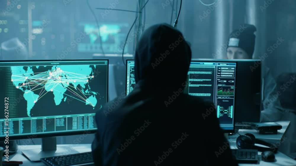 Poster team of internationally wanted hackers teem organize advanced virus attack on corporate servers. pla