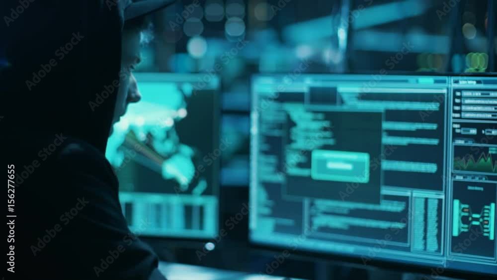 Poster Hooded Teenage Hacker Successfully Attacks Global Infrastructure Servers with Malware. Display Showing Stages of Hacking in Progress.  Shot on RED EPIC-W 8K Helium Cinema Camera.