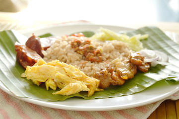 fried rice mixed with shrimp paste on banana leaf