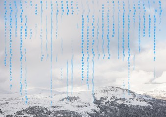 Blue code against snowy mountain tops