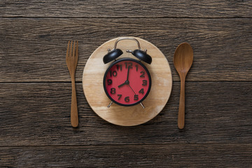 Food clock. Healthy food concept on wooden table