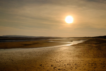  Camber Sands beach at sunset in spring at low tide, East Sussex, England