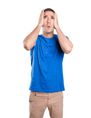 Depressed young man against white background