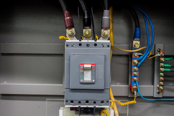 The main breakers and a wire connector