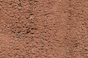 Background of a red cracked paint. Vintage texture.