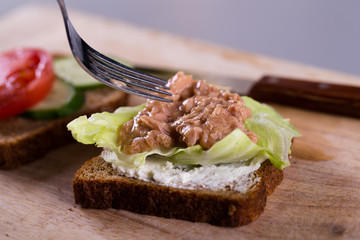Cooking fresh homemade grilled tuna sandwich