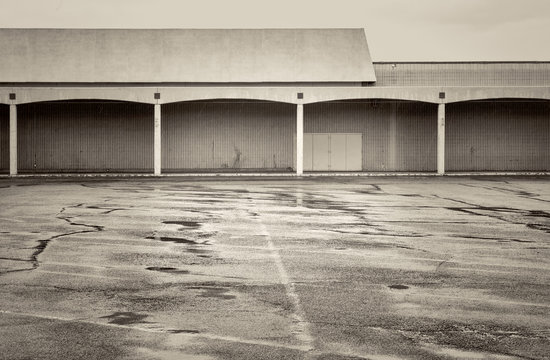 empty parking lot of a shut down mall