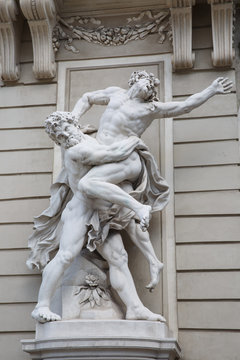Statue of Hercules fighting Antaeus at Hofburg palace entrance, Vienna, Austria