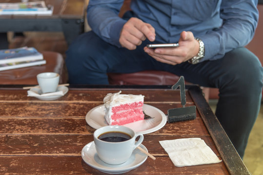 A cup of  coffee and cake.