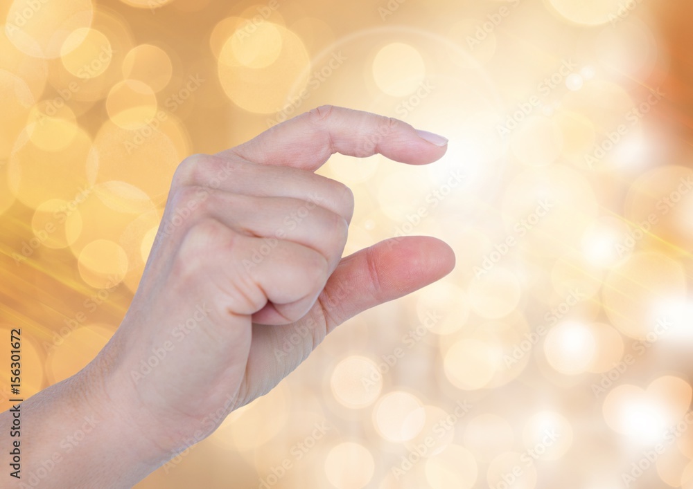 Poster hand gesturing small with sparkling light bokeh background