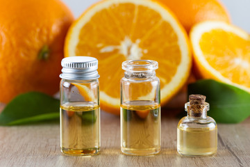 Orange aroma oil and fresh orange 
