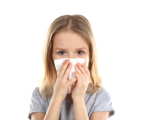 Small ill girl with napkin, isolated on white